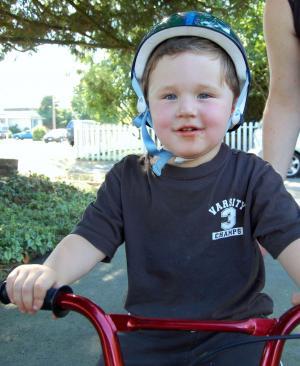 p 4 Kid on bike with helmet