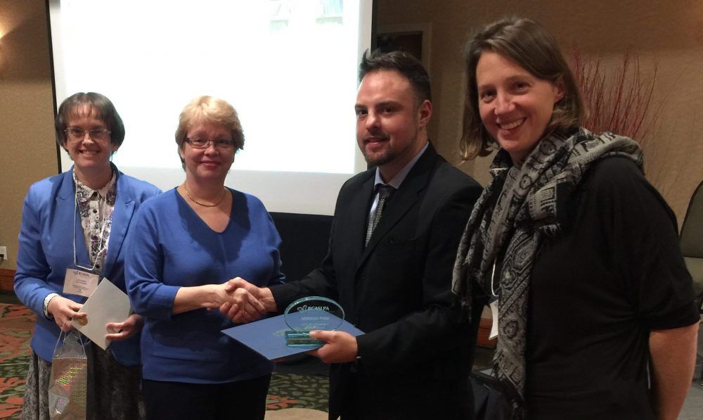 Deborah Pugh receiving award